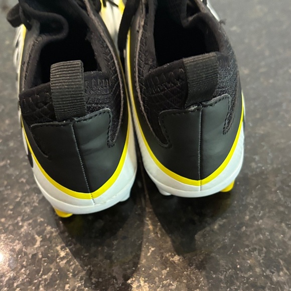 Umbro Black, Yellow, and White Soccer Cleats - Picture 7 of 8